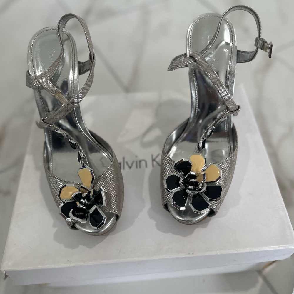 Parina textures metallic silver sandals.